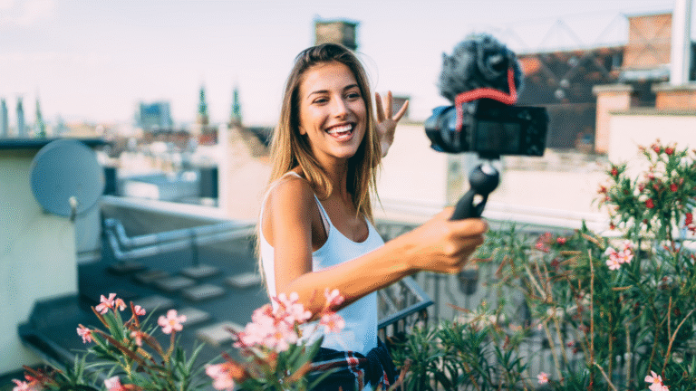 A woman is taking a video with their camera