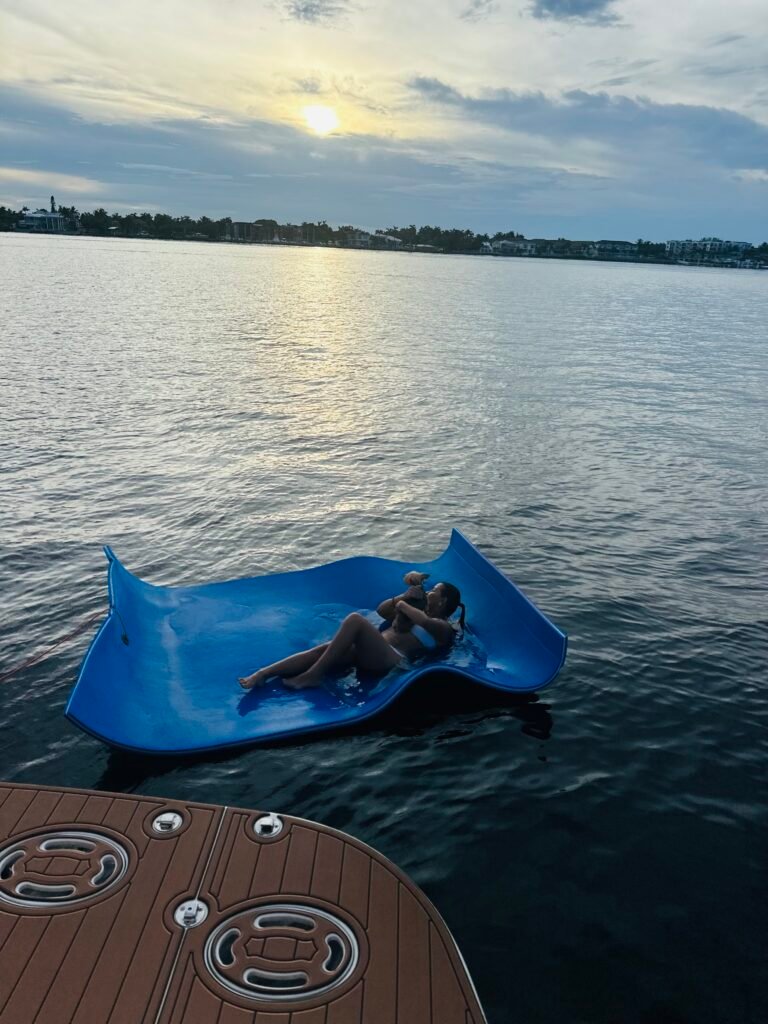A lady on the floating mat - Luxurious 52ft Sea Ray Flybridge Yacht